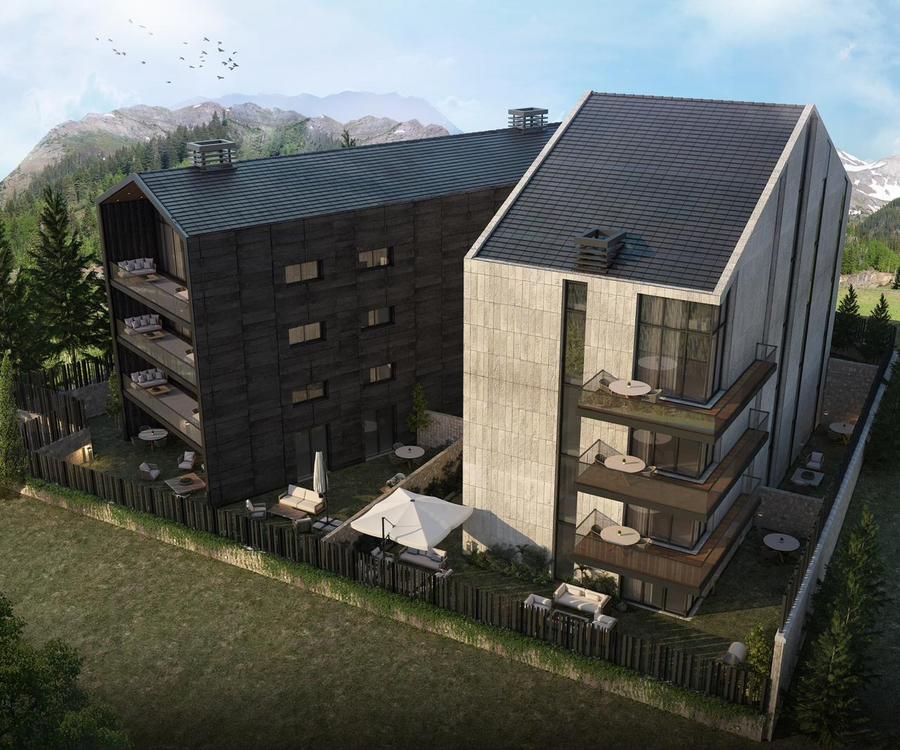 Faraya 2427 — elevated rear view with mountain backdrop and terraced balconies